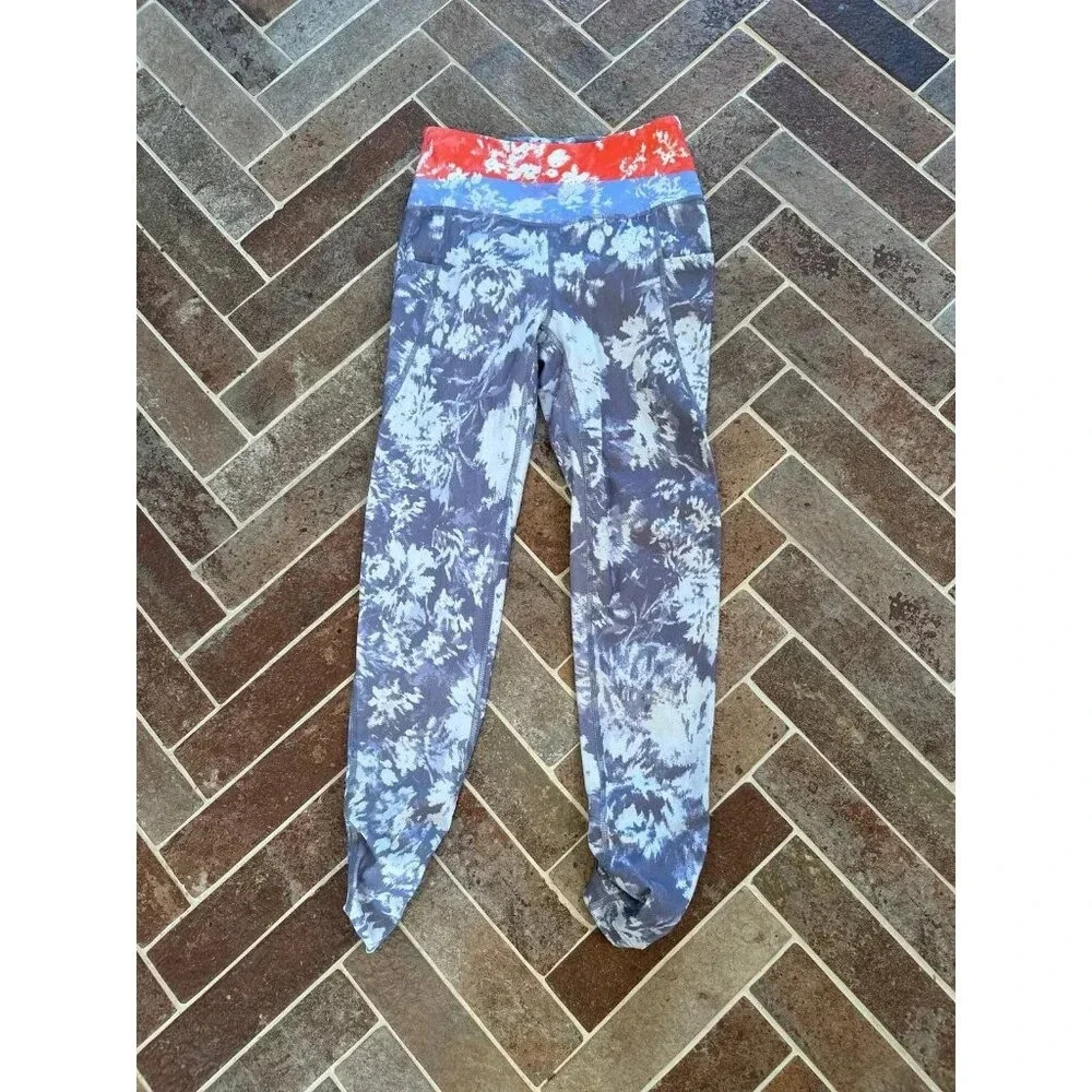 Free People Movement Cropped Grey/White Leggings with Orange/Blue size XS EUC